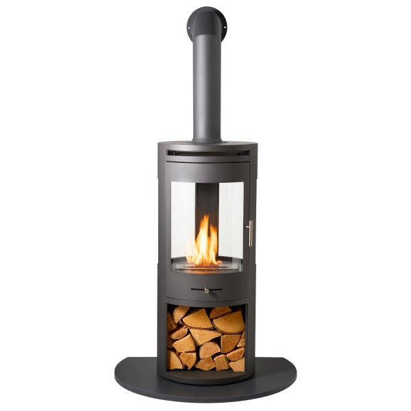 A modern dark gray bioethanol stove with a visible fire inside, a tall chimney pipe, and a circular base plate, shown on a plain white background.