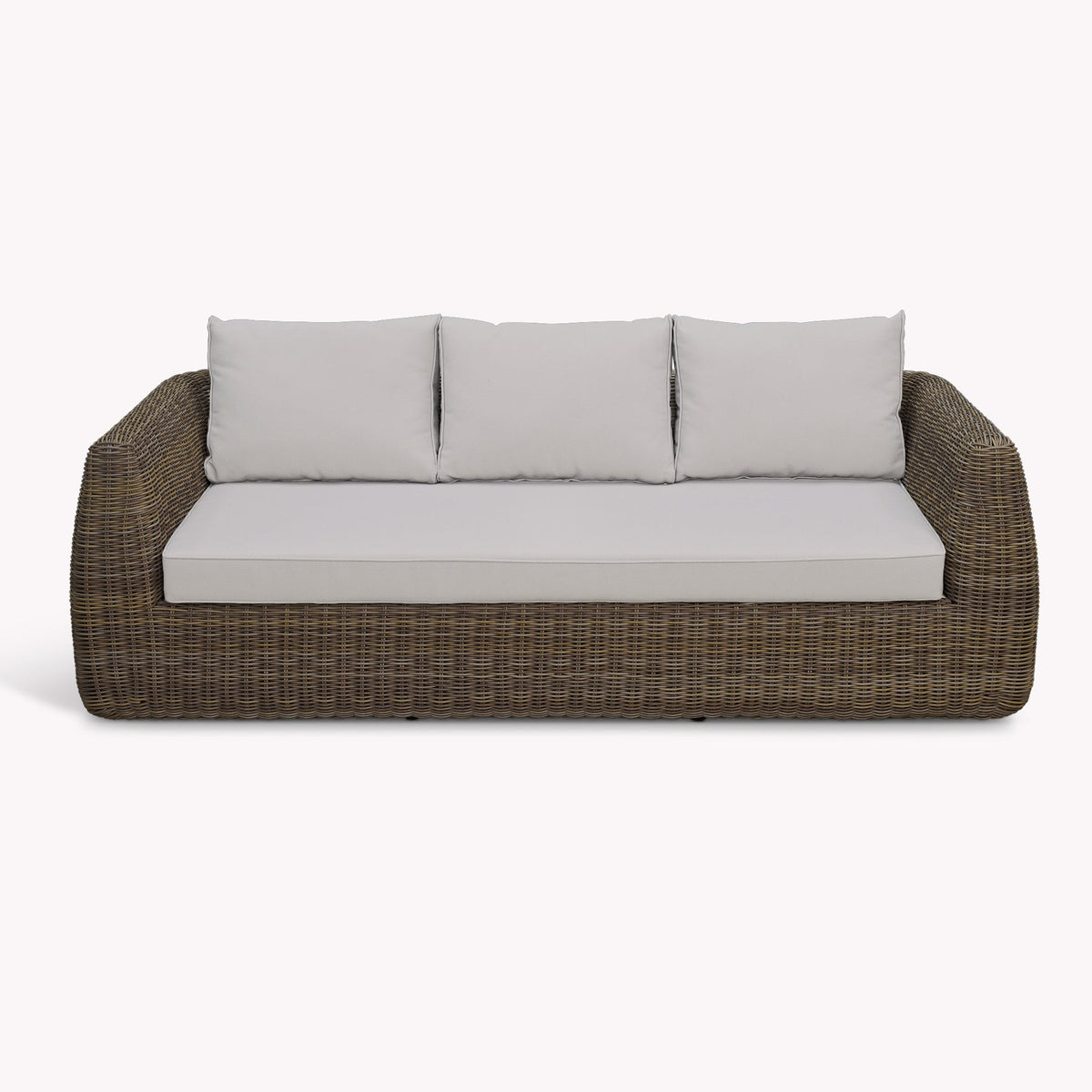 Brown wicker outdoor sofa with light gray cushions on a white background