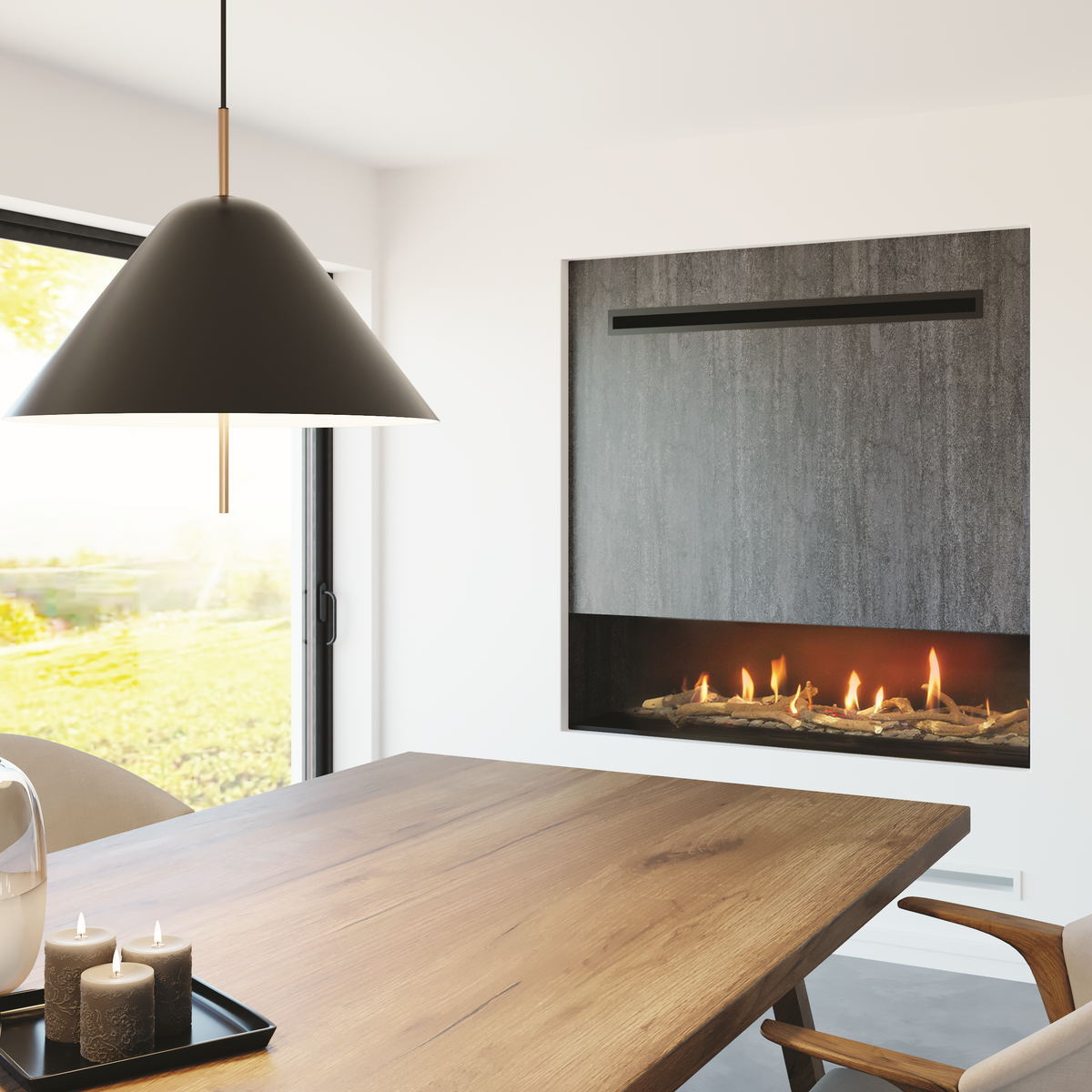 A modern built-in linear fireplace with a dark textured surround and visible flames, installed in a white wall of a contemporary dining room with a wooden table and pendant lights.